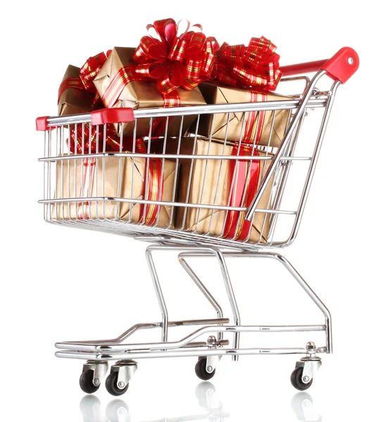 白で隔離されるショッピングカートに赤いリボンが付いている美しいゴールデン ギフト — ストック写真