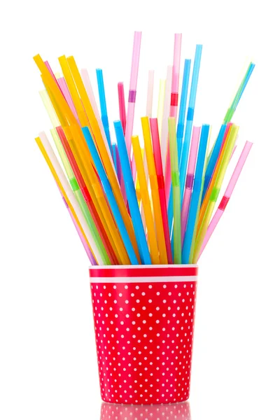 Red glass with straws isolated on white — Stock Photo, Image