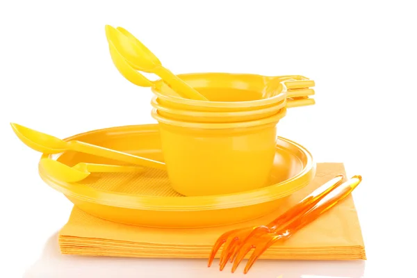 明るい黄色のプラスチック製食器類、白で隔離されるナプキン — ストック写真