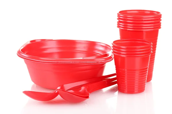 Jasně červené plastové nádobí izolovaných na bílém — Stock fotografie
