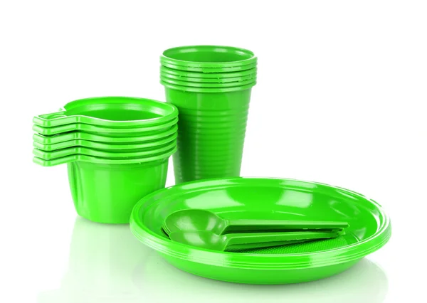 Ярко-зеленая пластиковая посуда изолирована на белом — стоковое фото