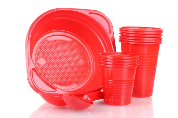 Louças de plástico vermelho brilhante isoladas em branco — Fotografia de Stock