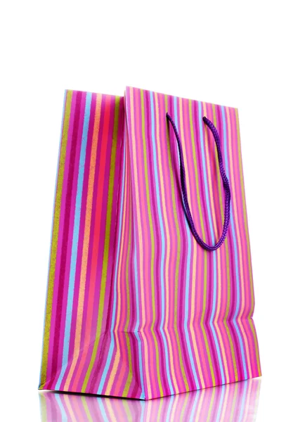 Çizgili hediye çanta üzerinde beyaz izole — Stok fotoğraf