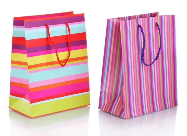 Bright gift bags isolated on white — Stock Photo, Image