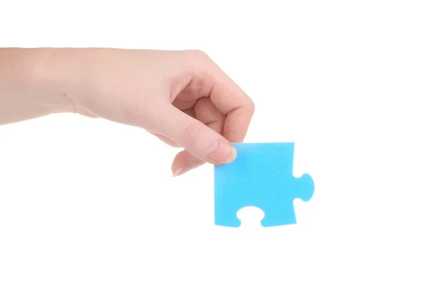 Hand en puzzel, geïsoleerd op wit — Stockfoto