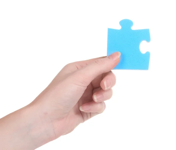 Hand en puzzel, geïsoleerd op wit — Stockfoto
