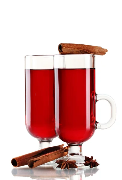 Mulled wine in the glasses, cinnamon and anise isolated on white — Stock Photo, Image