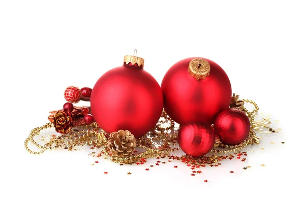 Beautiful red Christmas balls and cones isolated on white — Stock Photo, Image