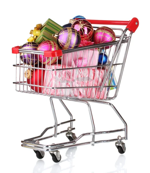 Beautiful bright Christmas balls and gifts in the cart isolated on white — Stock Photo, Image