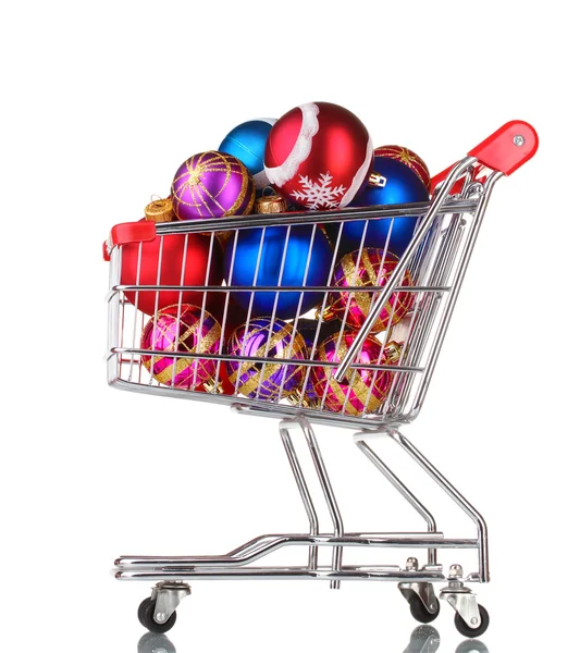 Beautiful bright Christmas balls in the cart isolated on white — Stock Photo, Image