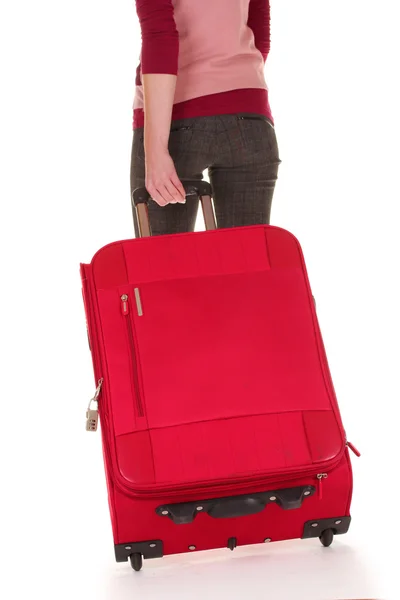 Viajero con una maleta aislada en blanco — Foto de Stock