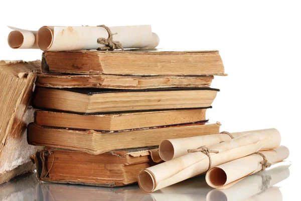 stock image Pile of old books and scroll isolated on white