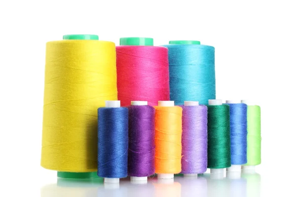 Many-coloured bobbins of thread isolated on white — Stock Photo, Image