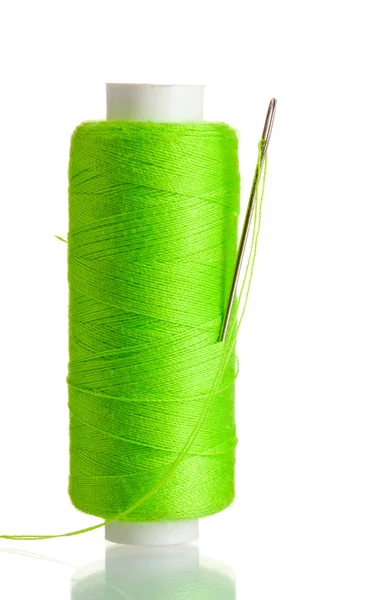 Green bobbin with needle isolated on white — Stock Photo, Image