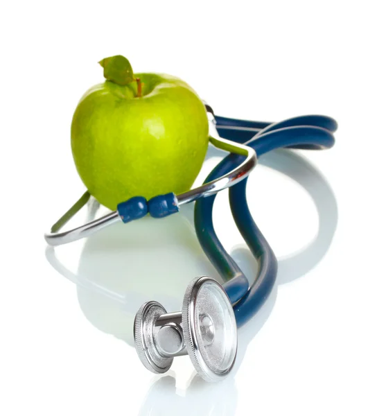 Sağlık stetoskop ve yeşil elma üzerine beyaz izole — Stok fotoğraf