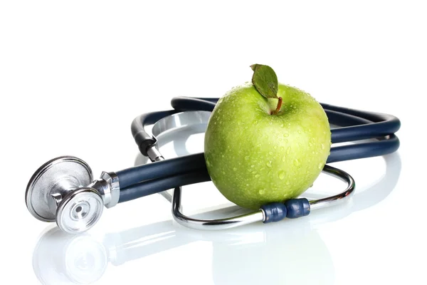 Medizinisches Stethoskop und grüner Apfel isoliert auf weiß — Stockfoto