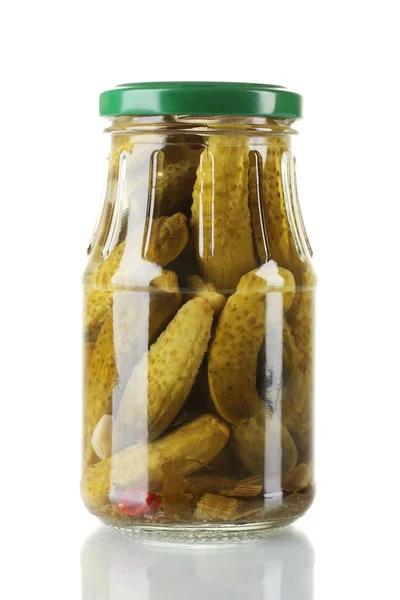 Marinated cucumbers in a glass jar isolated on white — Stock Photo, Image