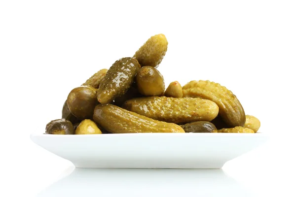 stock image Marinated cucumbers on the plate isolated on white