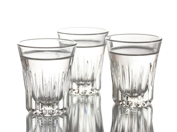 Three glass of vodka isolated on white — Stock Photo, Image