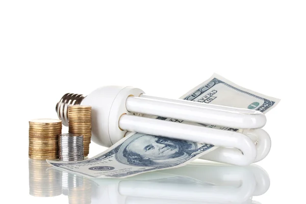 Enerji tasarruflu lamba ve para üzerine beyaz izole — Stok fotoğraf