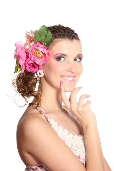 Mooi meisje met bloemen in haar haar geïsoleerd op wit — Stockfoto