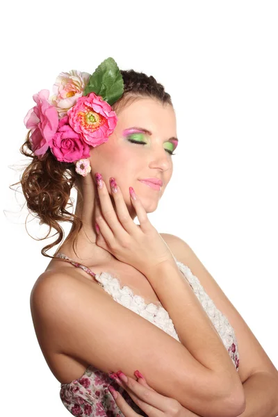 Hermosa chica con flores en el pelo aislado en blanco — Foto de Stock