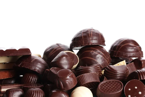 Πολλές διαφορετικές σοκολάτα καραμέλα που απομονώνονται σε λευκό — Φωτογραφία Αρχείου