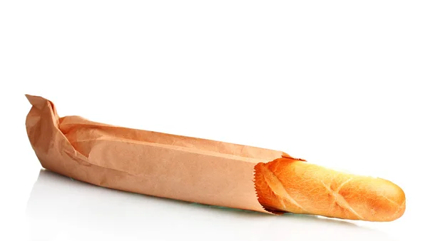 Deliciosa baguette en bolsa de papel aislada en blanco —  Fotos de Stock