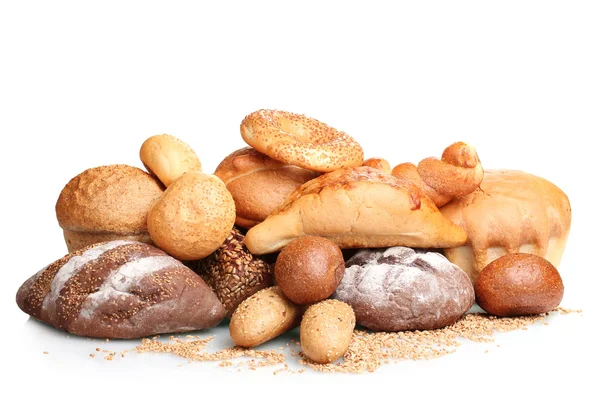 Delicious breads and wheat isolated on white — Stock Photo, Image