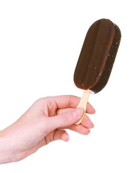 1 つのチョコレート バニラ アイスクリームが白で隔離される手で — ストック写真