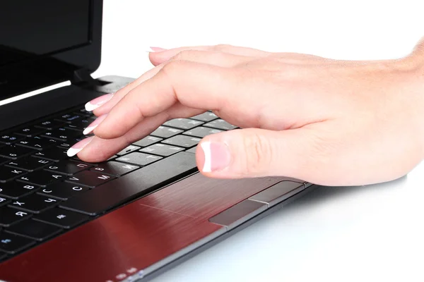 Nueva computadora portátil y la mano de la mujer aislada en blanco — Foto de Stock