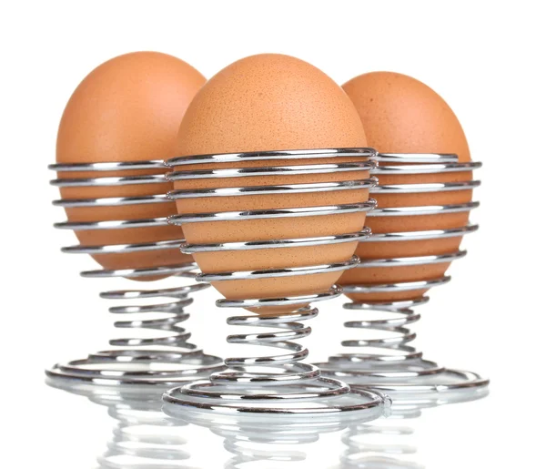 Vařená vejce v kovových stojanů izolovaných na bílém — Stock fotografie
