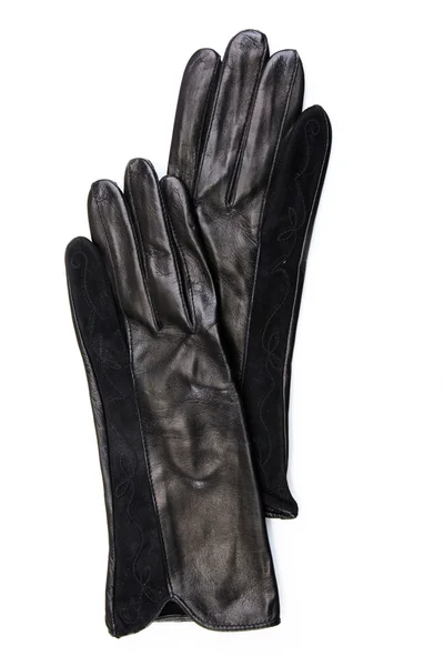 Beautiful black leather women 's gloves isolated on white — стоковое фото