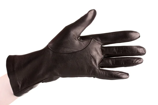 Ženy ruku v černé kožené rukavice izolované na bílém — Stock fotografie