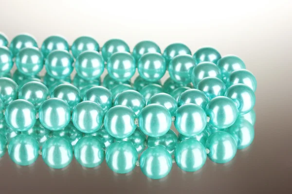 Beautiful blue pearl beads isolated on white — Stock Photo, Image
