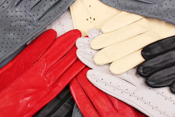Lot of beautiful women leather gloves closeup — Stock Photo, Image