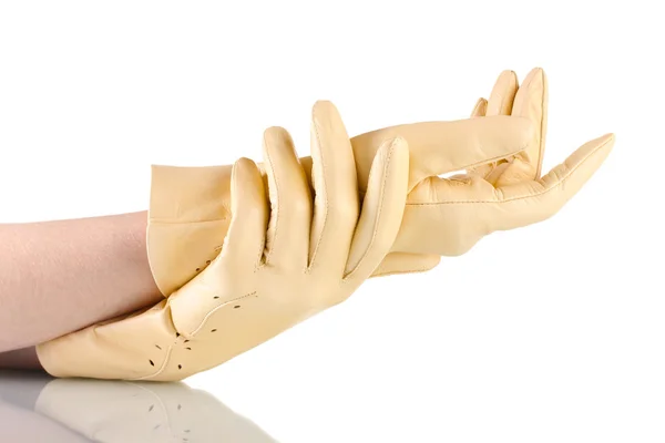 Tjejhänder i beige läder handskar isolerad på vit — Stockfoto