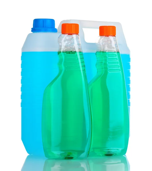 Canister with liquid and detergent bottles isolated on white — Stock Photo, Image
