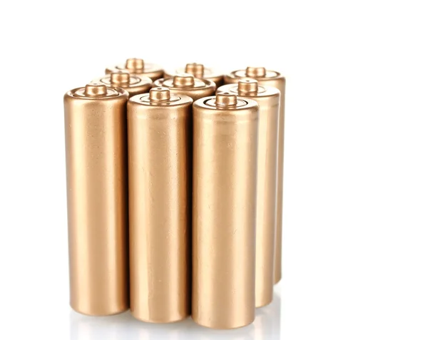 Baterias douradas isoladas em branco — Fotografia de Stock