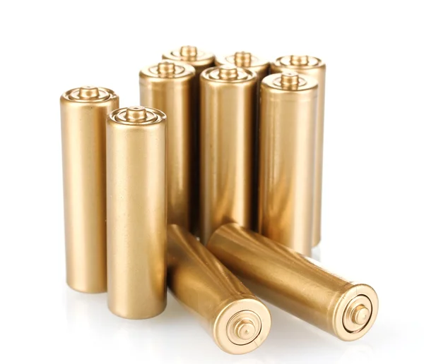 Baterias douradas isoladas em branco — Fotografia de Stock