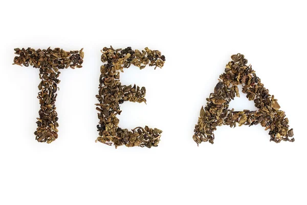 Palabra de té hecha de hojas secas aisladas en blanco — Foto de Stock