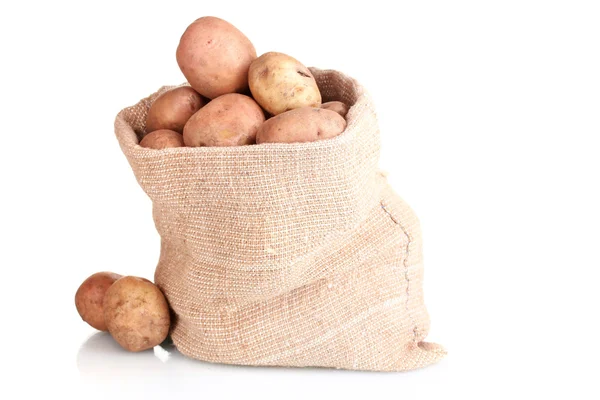 Fresh potatoes in the bag isolated on white — Stock Photo, Image
