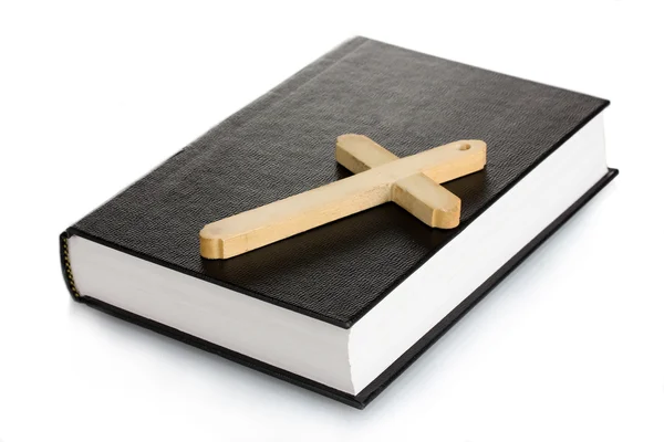 Bible and wooden cross isolated on white — Stock Photo, Image