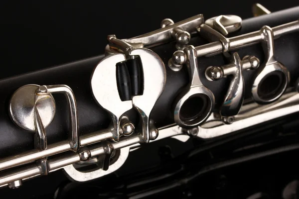 Close up detail of clarinet on black background — Stock Photo, Image