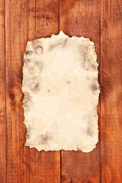 Stary papier na drewnianym tle — Zdjęcie stockowe