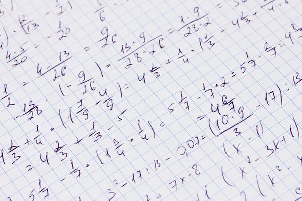 Math, physics and geometry on copybook page closeup — Stock Photo, Image
