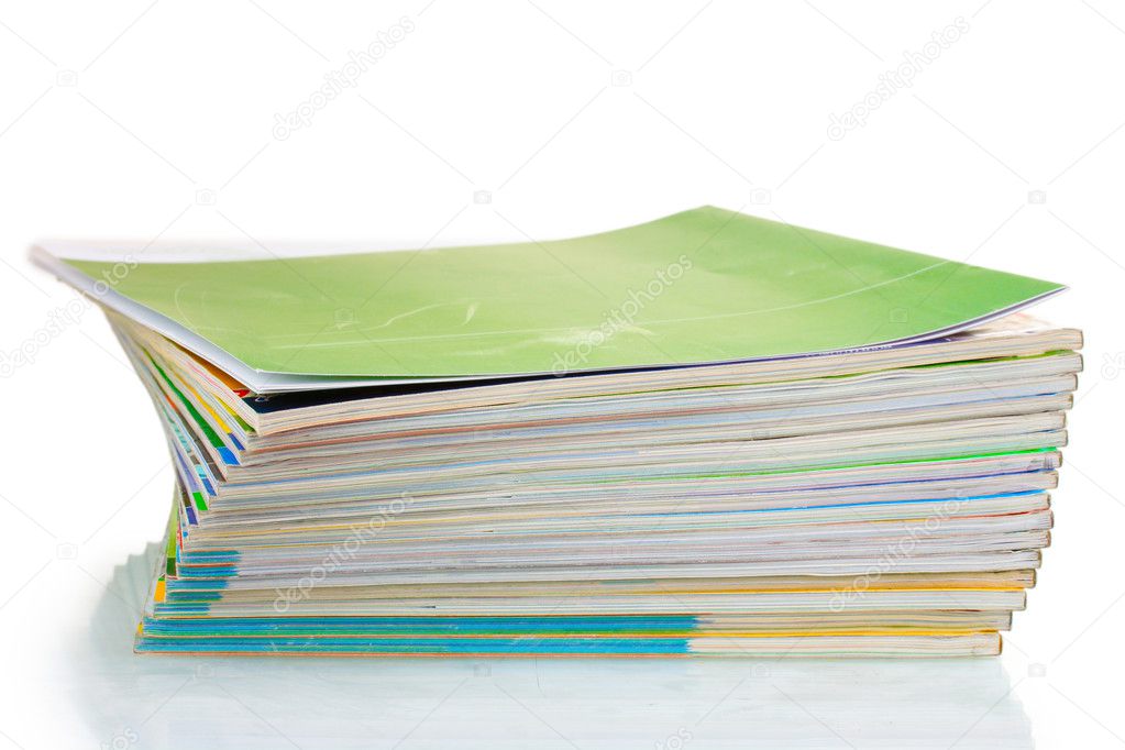 Stack of magazines isolated on white