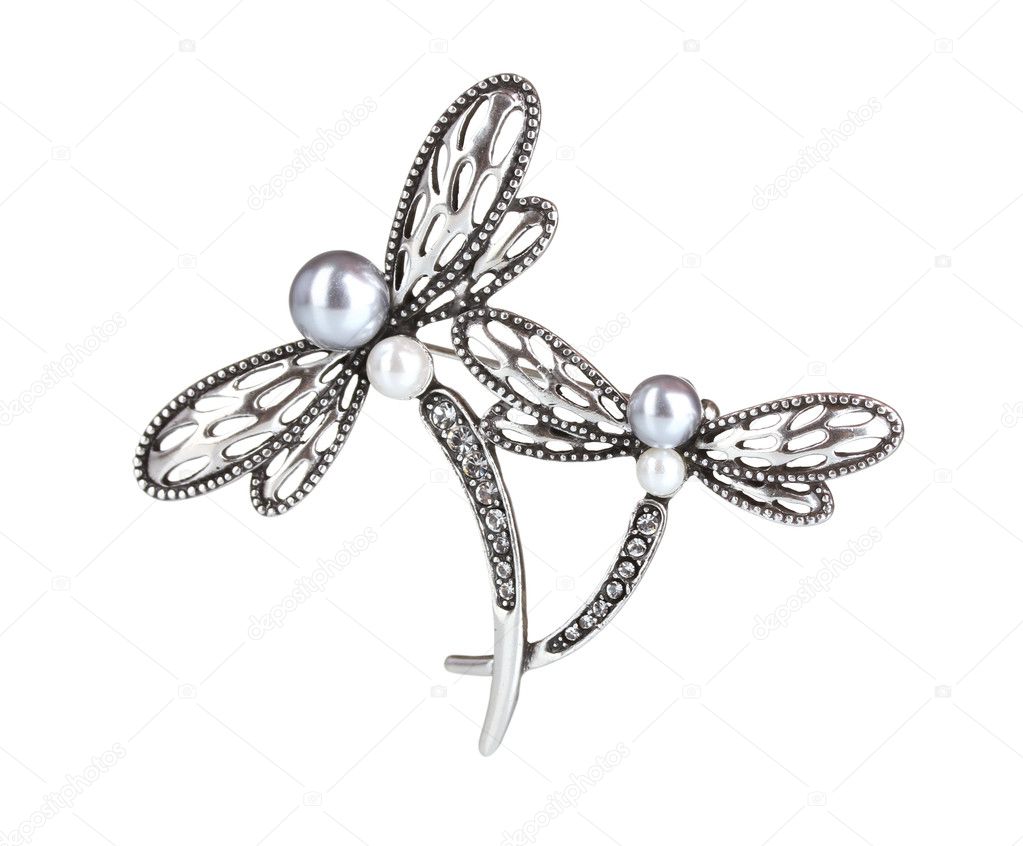 Beautiful silver brooch with precious stones isolated on white