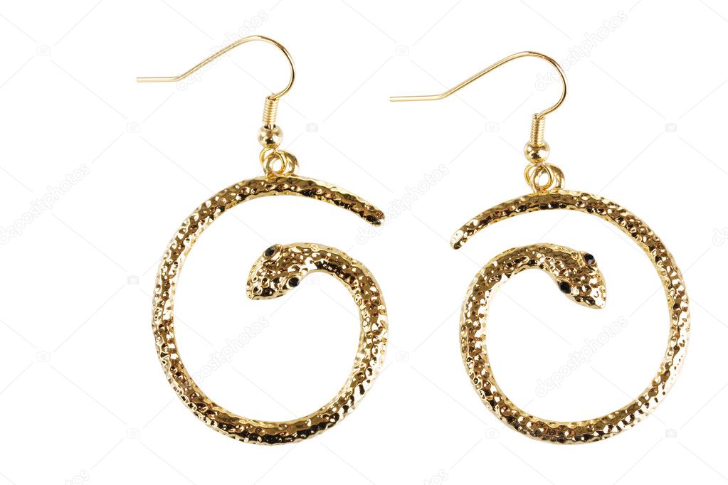 Beautiful gold earrings isolated on white