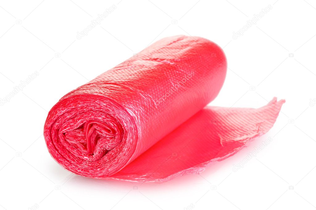Roll of red garbage bags isolated on white